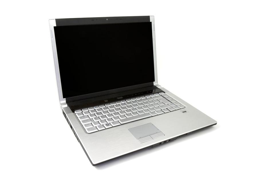 silver laptop on white background