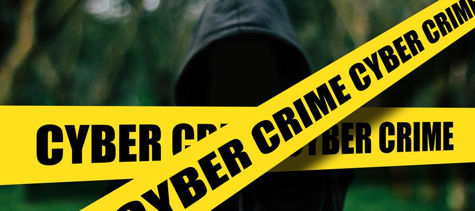 yellow ribbon for crime during cyberattack against the background of a person