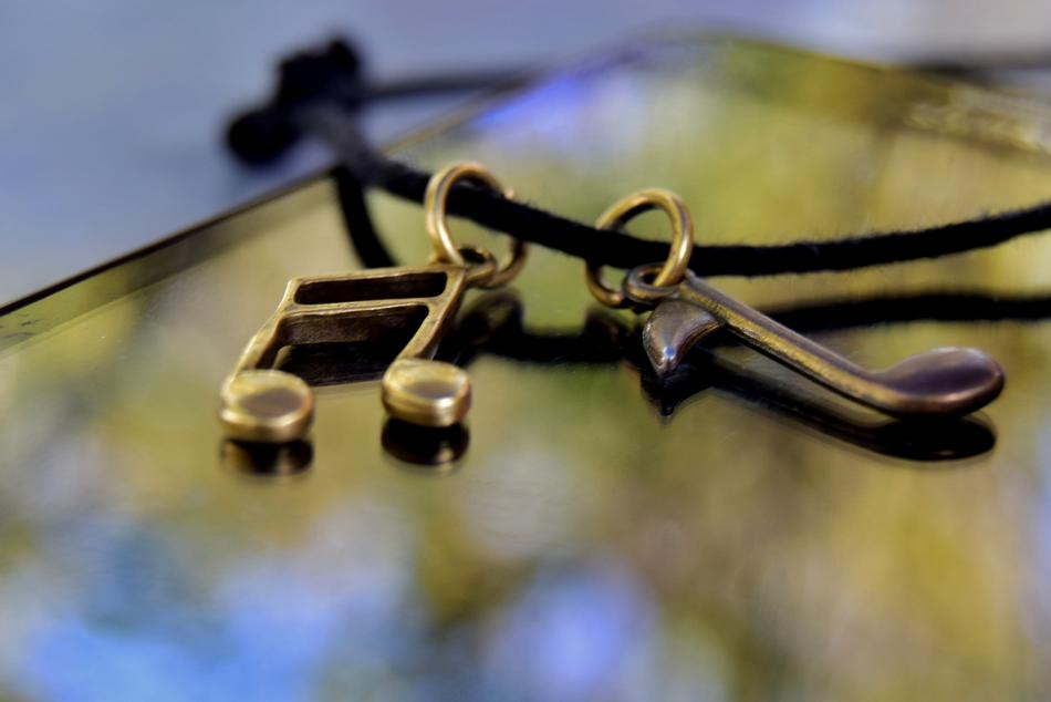notes as decorations on a string on a blurred background