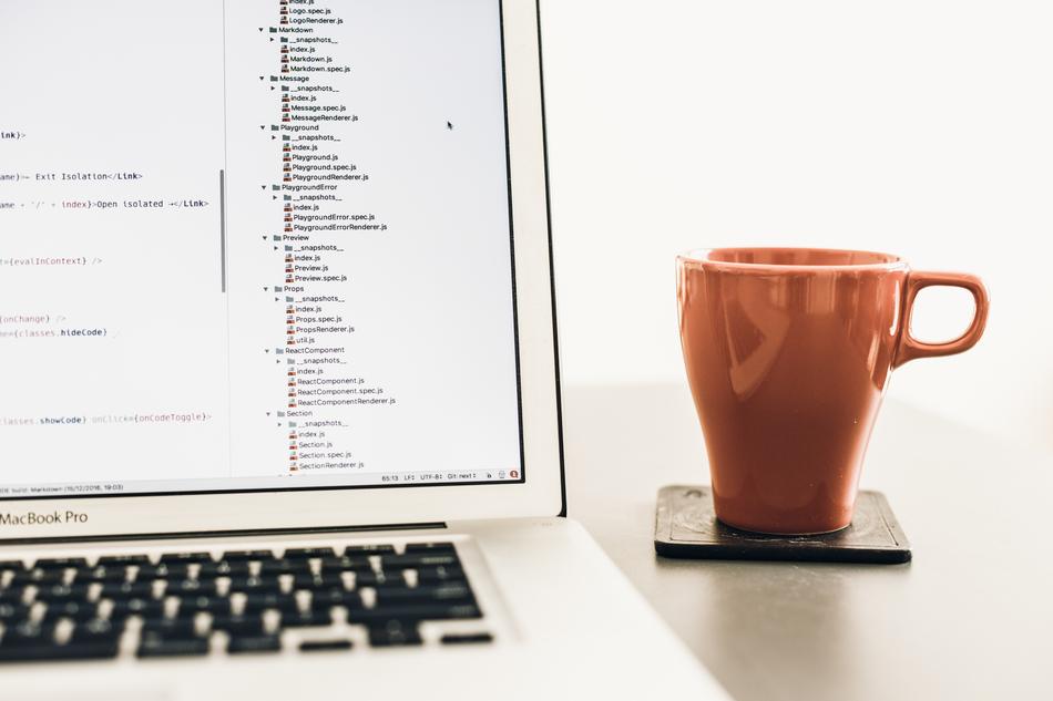 Cup and Coffee and Macbook