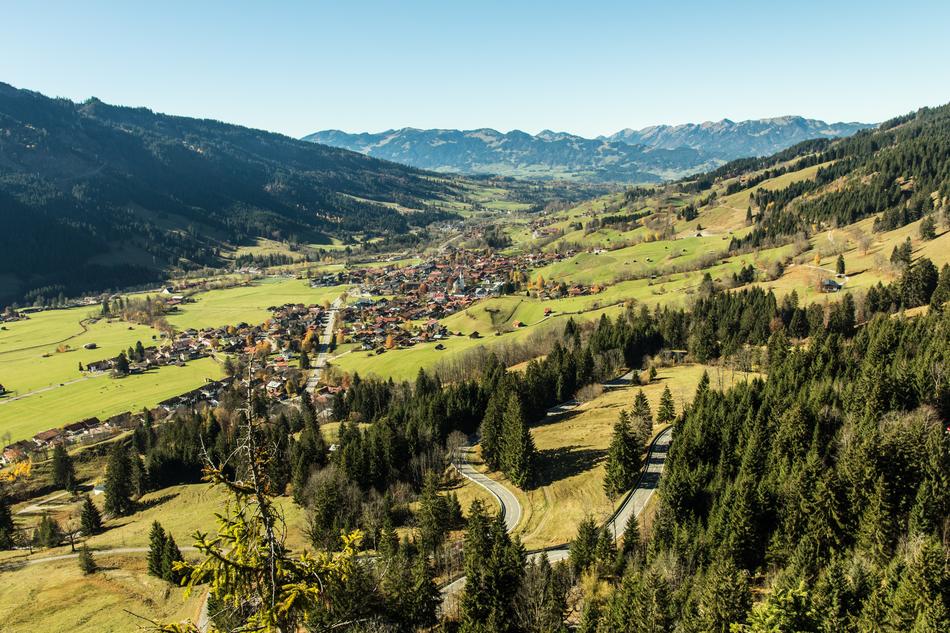 Beautiful landscape with Ostrachtal, on the colorful mountains with trees, in AllgÃ¤u. Germany