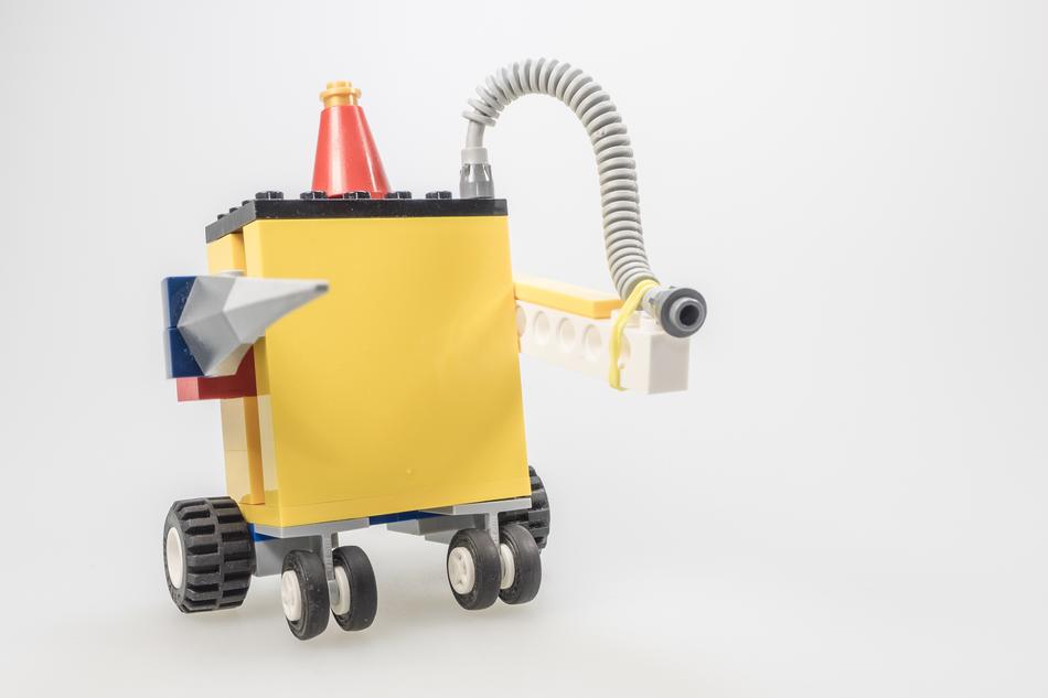 Colorful LEGO model of the wall-e, at white background, in light