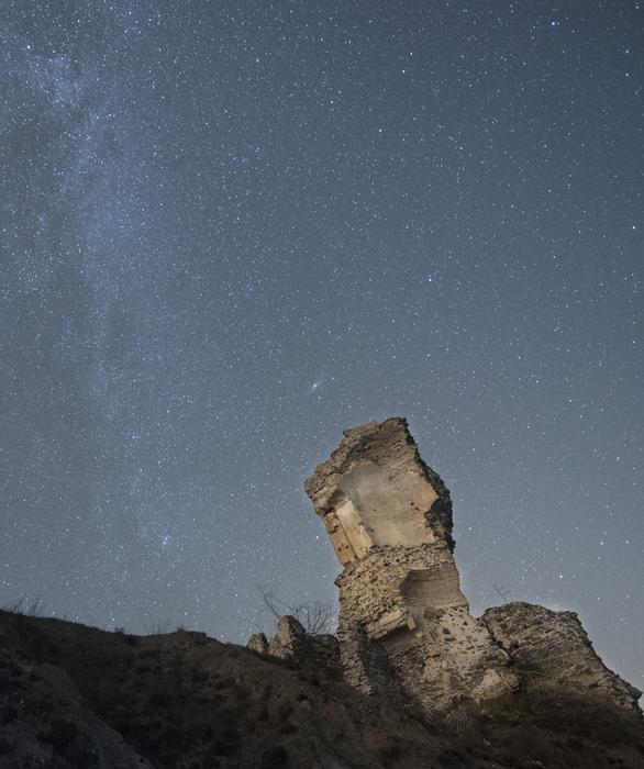 milky way over the old tower