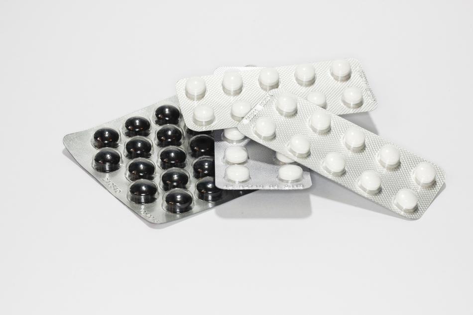 Black and white tables in the shiny packages, in light, at white background