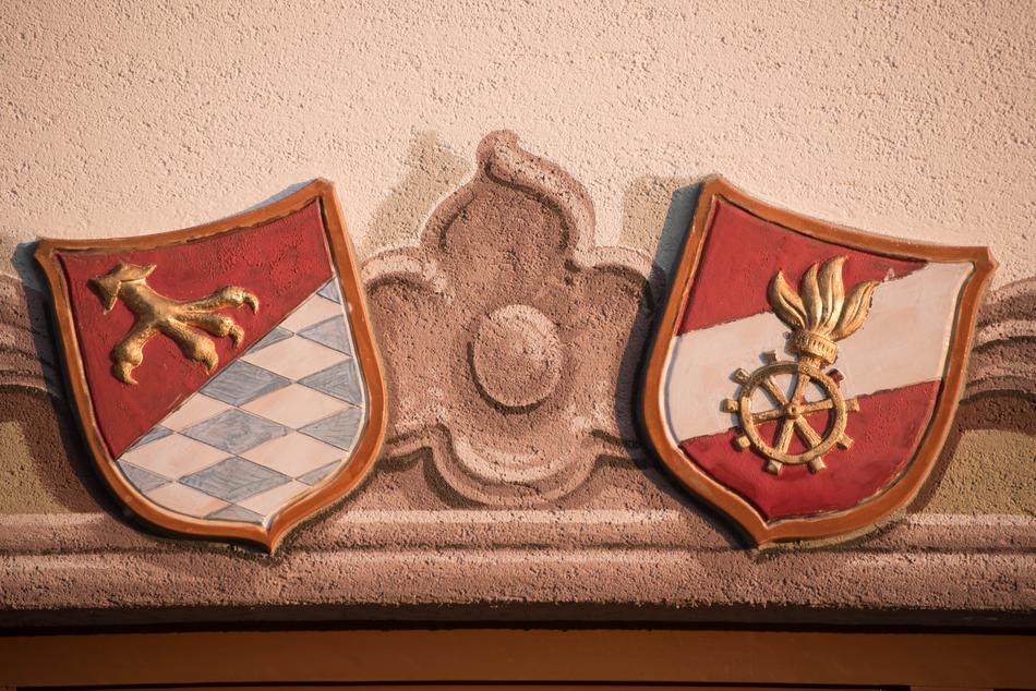 Close-up of the colorful and beautiful coats of arms with signs