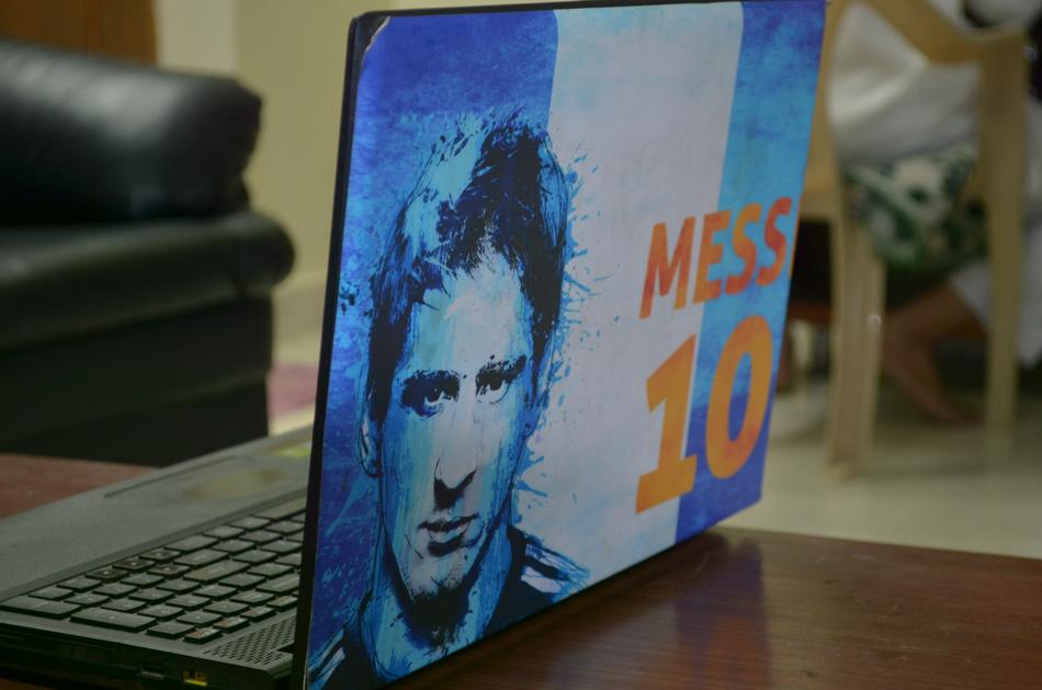 portrait of Messi on the laptop cover