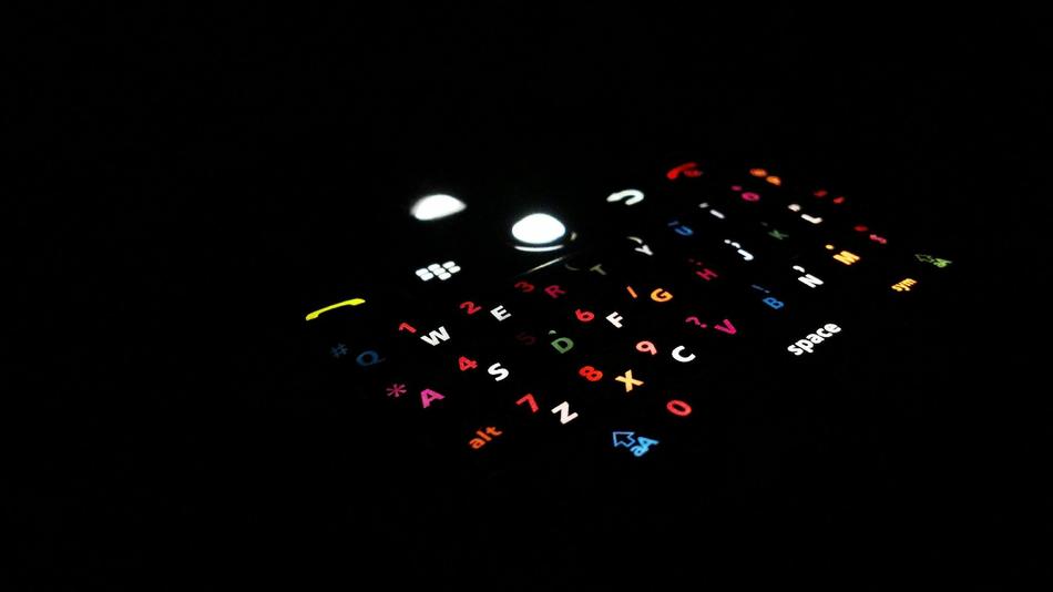 multicolored glowing notebook letters