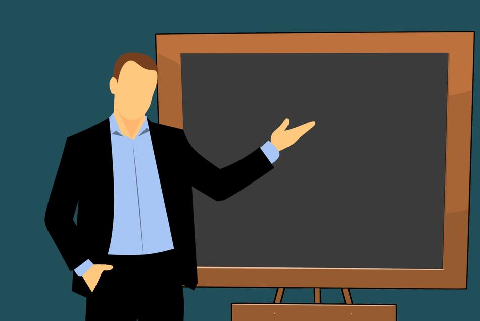Man in suit near the board