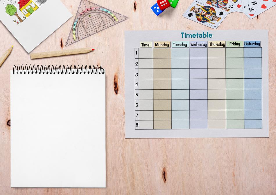 Timetable and Paper for Drawing on pink desk