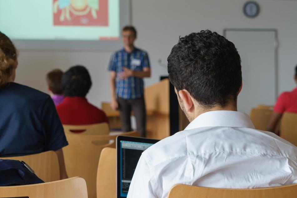 Seminar, speaker in front of auditory