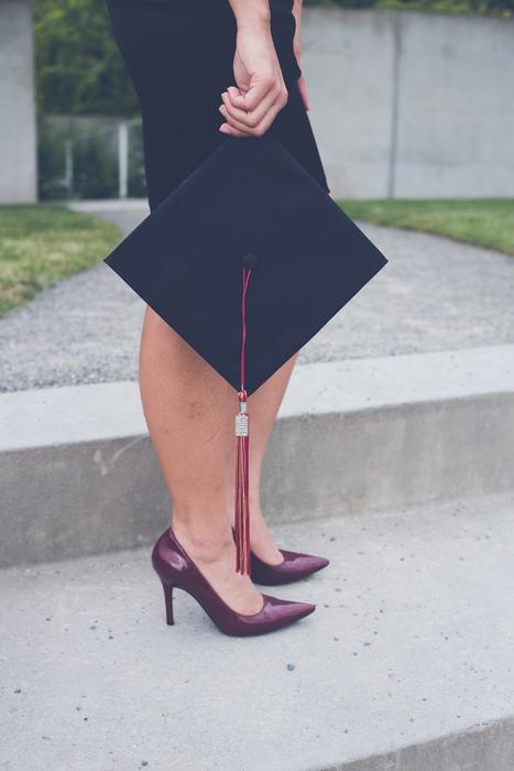 Graduation cap in female hand