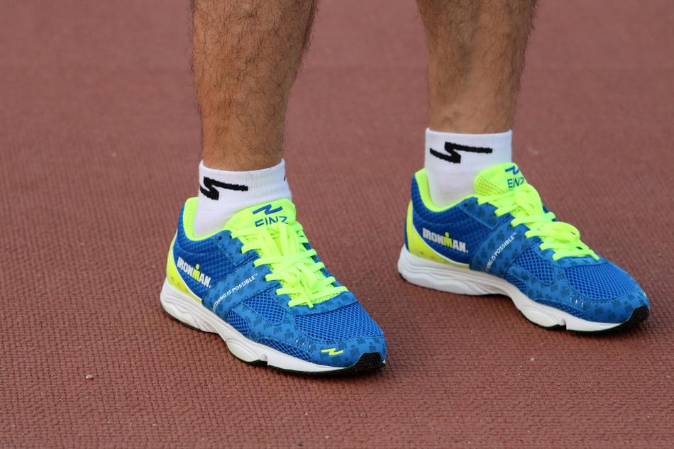 Bright green and blue shoes on the man