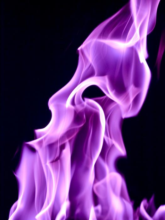 purple flame at darkness