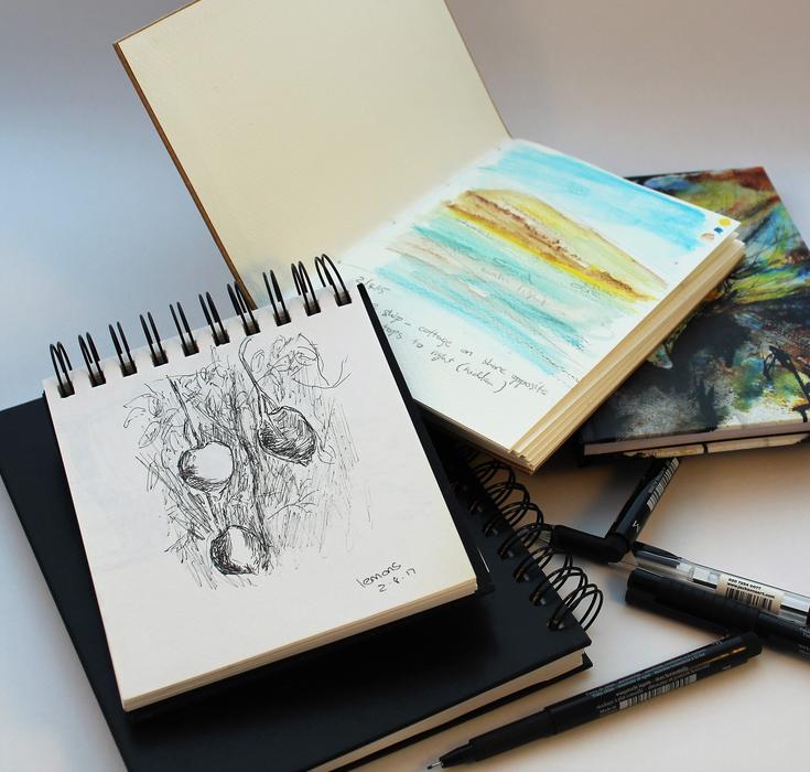 albums for painting on the table