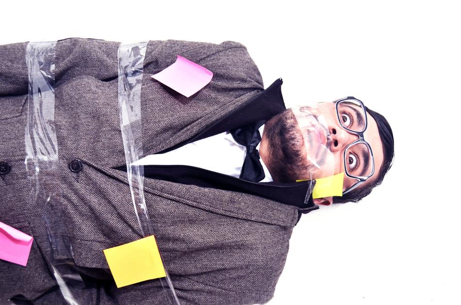 the man is bound with tape