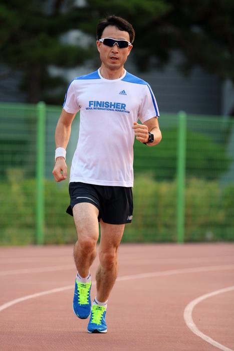 athlete on the run track at the stadium
