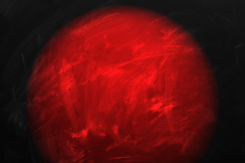 red light circle on dirty blackboard