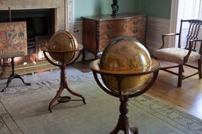 cabinet with fireplace and antique furniture