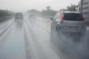 cars on Highway at rainy weather, Germany