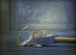 photo of a pencil in a sharpener on a blurred background