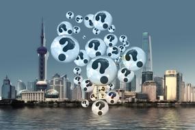 question marks on the background of the metropolis skyscrapers