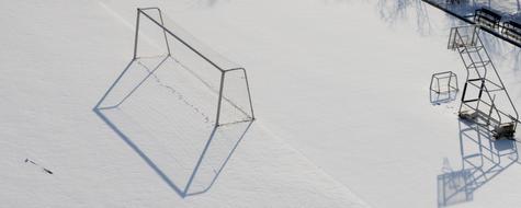 School sports ground on snowy Winter