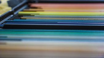 Beautiful and colorful, wooden pencils in the black box