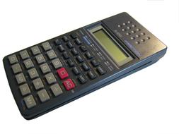 Black calculator with colorful buttons at white background