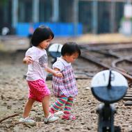 Children of the elementary school ,near the railroad, on the street