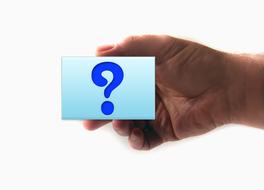 Turquoise and white, gradient sign with blue question sign, in the hand
