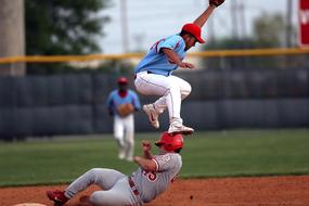 Baseball players, in the colorful uniform, playing on the colorful field, on the competition