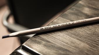 brown pencil on the table