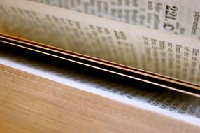 Bible book, with the open pages, with the black text