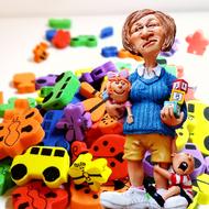 Baby-Sitter figurine at pile of Toys