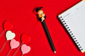 Paper Desktop red heart and pen