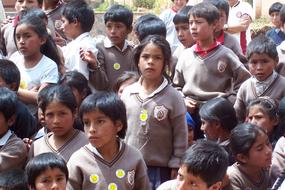 Children, near the school, in the crowd