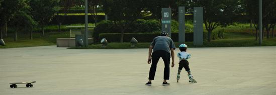 skating training kid in park