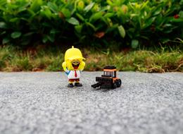 Lego Toys, construction vehicle and happy man in helmet