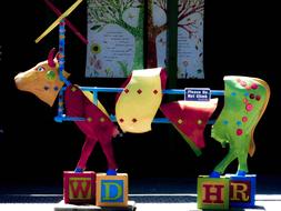 Colorful and beautiful cow with "W D H R" letters in Portland, Oregon, USA