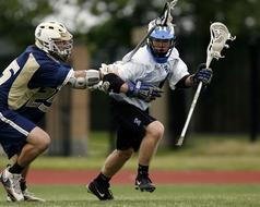 Lacrosse Action Competition in a blurred background