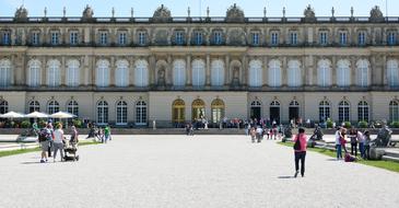 tourists in the square near the castle