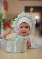 photo of young girl cooker