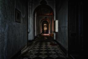 checkerboard floor in the corridor of the building
