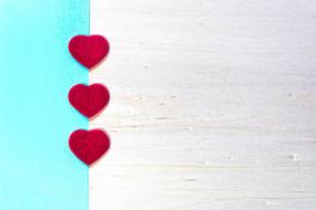 background with three red hearts