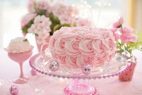 beautiful cake with pink roses frosting