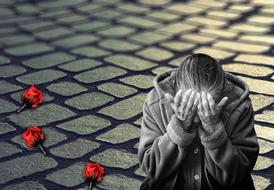 painted upset old woman and red rose buds
