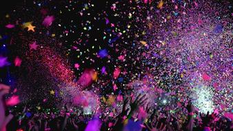 crowd of people and colorful sweets at a concert