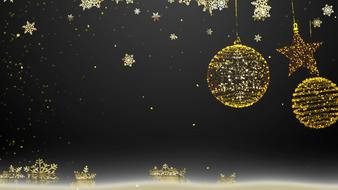 Beautiful, yellow, shiny Christmas decorations and snowflakes at black background