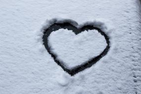 Heart drawn on Frosty glass