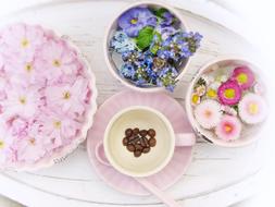 Flowers and coffee beans on Tray